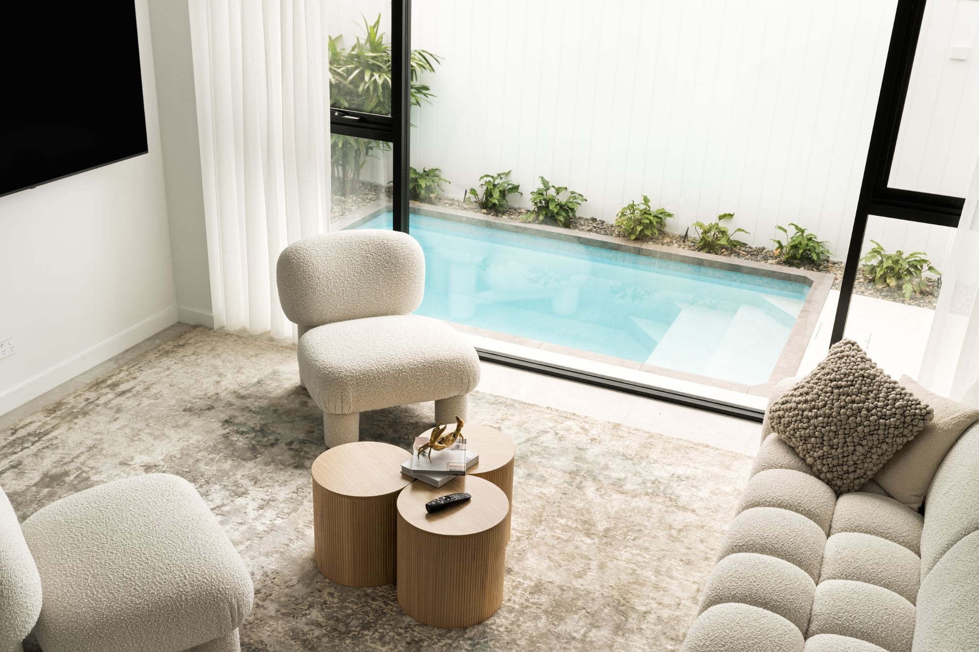 The Plungie Studio maximising space in a compact backyard. Creating a cohesive indoor-outdoor flow.